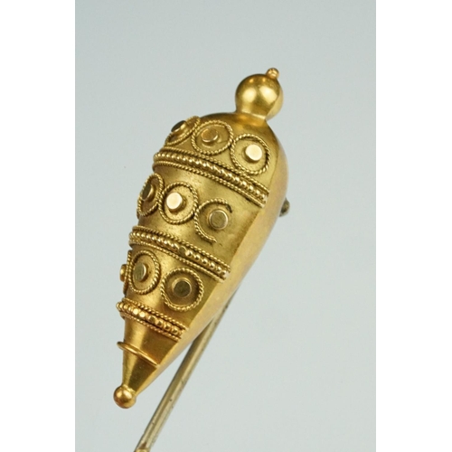 72 - 19th century yellow metal stick pin, the Etruscan Revival tapered head with bead and rope twist deta... 