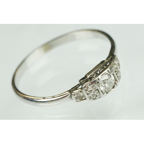 75 - Art Deco diamond solitaire white metal ring, the round old cut diamond weighing approx 0.15 carat, c... 