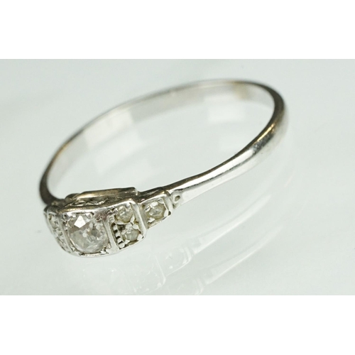 75 - Art Deco diamond solitaire white metal ring, the round old cut diamond weighing approx 0.15 carat, c... 