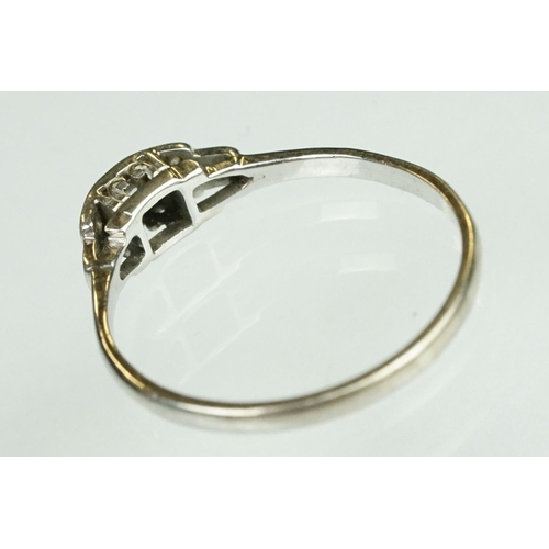 75 - Art Deco diamond solitaire white metal ring, the round old cut diamond weighing approx 0.15 carat, c... 