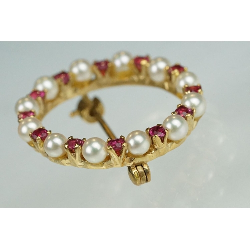 76 - Ruby and cultured pearl 9ct yellow gold brooch, small round cut rubies, claw set, small round white ... 