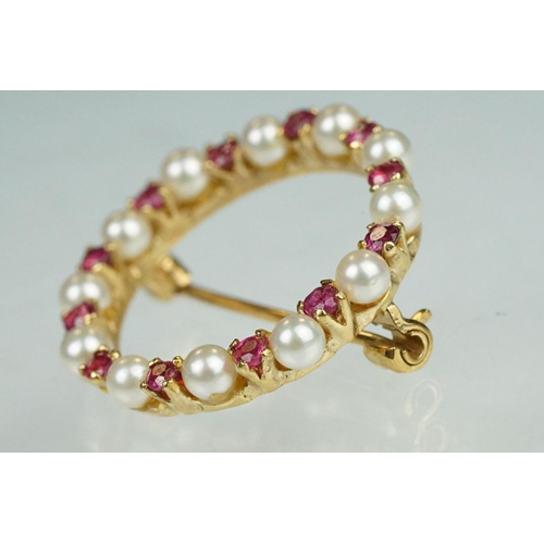 76 - Ruby and cultured pearl 9ct yellow gold brooch, small round cut rubies, claw set, small round white ... 