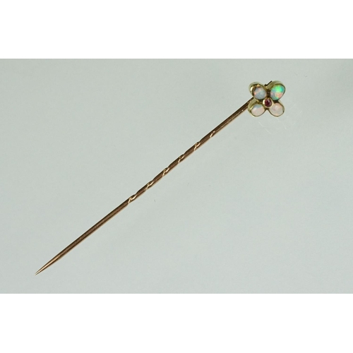 79 - Opal and garnet quatrefoil flower head yellow and rose metal stick pin, four oval cabochon cut preci... 