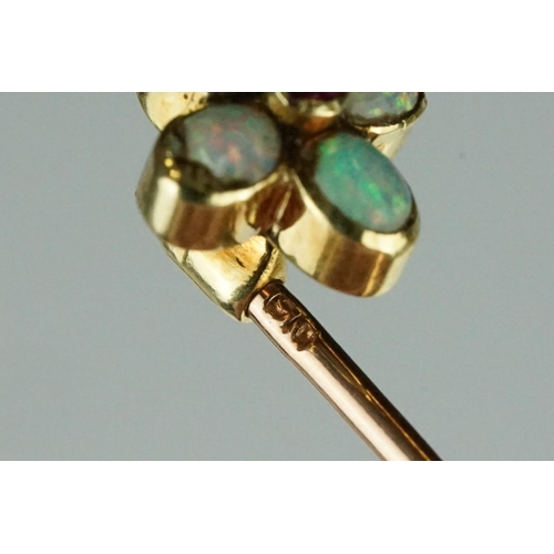 79 - Opal and garnet quatrefoil flower head yellow and rose metal stick pin, four oval cabochon cut preci... 