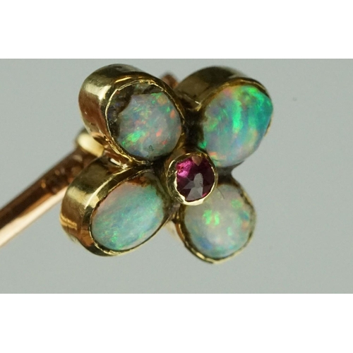 79 - Opal and garnet quatrefoil flower head yellow and rose metal stick pin, four oval cabochon cut preci... 