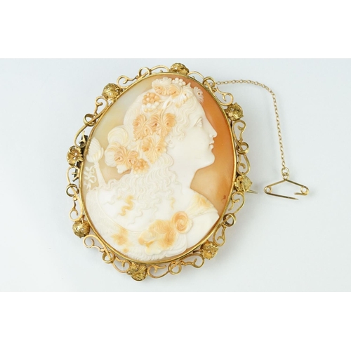 8 - Large 19th century shell cameo yellow metal brooch, the carved shell cameo depicting female bust loo... 