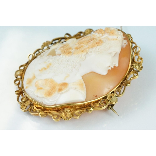 8 - Large 19th century shell cameo yellow metal brooch, the carved shell cameo depicting female bust loo... 