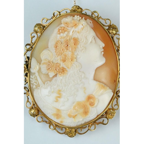 8 - Large 19th century shell cameo yellow metal brooch, the carved shell cameo depicting female bust loo... 