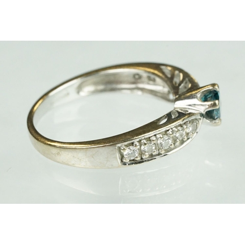 87 - Synthetic blue diamond and colourless diamond 18ct white gold ring, the round brilliant cut syntheti... 