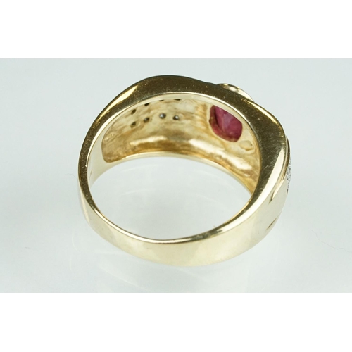 89 - Ruby and diamond 9ct yellow gold ring, oval mixed cut ruby measuring approx 7mm x 5mm, rubover set, ... 