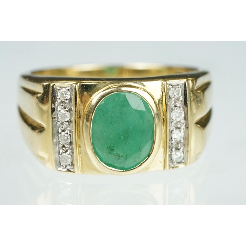 91 - Emerald and diamond 9ct yellow gold Gents ring, the oval mixed cut emerald measuring approx 9mm x 7m... 