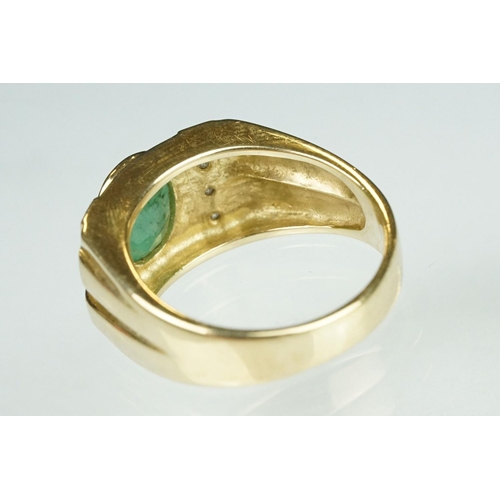 91 - Emerald and diamond 9ct yellow gold Gents ring, the oval mixed cut emerald measuring approx 9mm x 7m... 