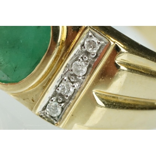 91 - Emerald and diamond 9ct yellow gold Gents ring, the oval mixed cut emerald measuring approx 9mm x 7m... 