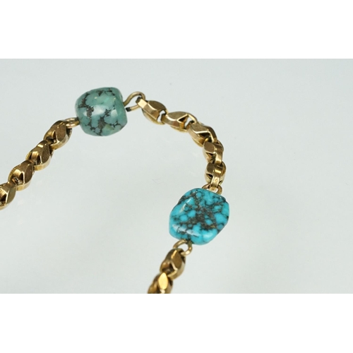 92 - Early 20th century turquoise and yellow metal necklace, eleven asymmetric rough turquoise beads, fan... 