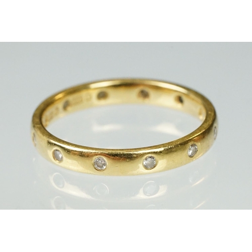 93 - Diamond 18ct yellow gold wedding band, the D shank band set with twelve small round brilliant cut di... 