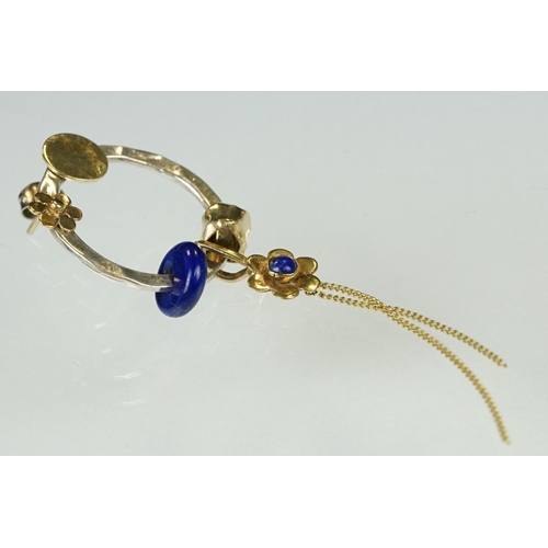 96 - Pair of handmade lapis lazuli, silver and unmarked yellow gold earrings, the silver planished hoop w... 