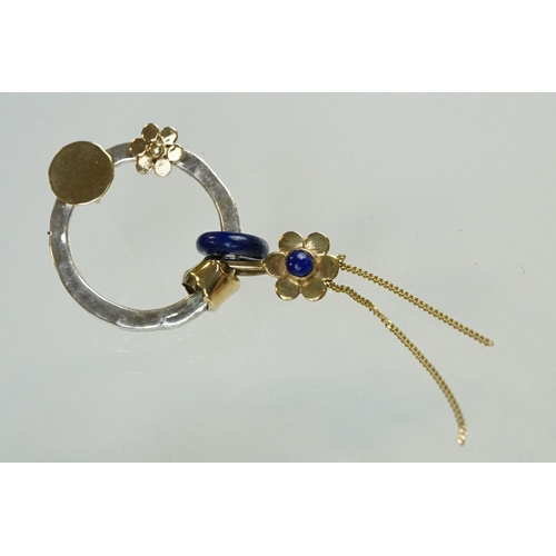 96 - Pair of handmade lapis lazuli, silver and unmarked yellow gold earrings, the silver planished hoop w... 