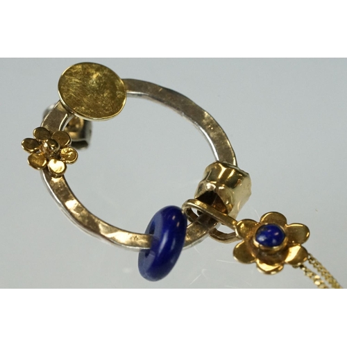 96 - Pair of handmade lapis lazuli, silver and unmarked yellow gold earrings, the silver planished hoop w... 