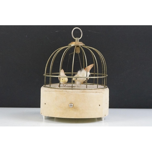 10 - Mid 20th Century automaton musical jewellery box in the form of a bird cage having an upholstered ba... 