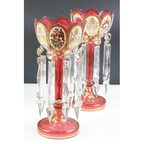 11 - Pair of 19th Century Victorian cranberry glass lustres, each having scalloped rims with floral panel... 