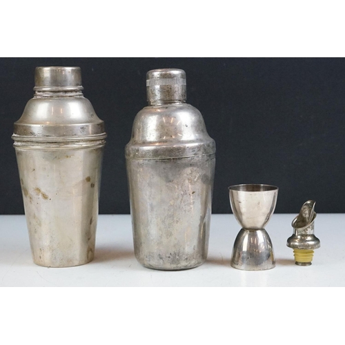 12 - Two Early-to-mid 20th century silver plated cocktail shakers of typical form (tallest approx 19.5cm)... 