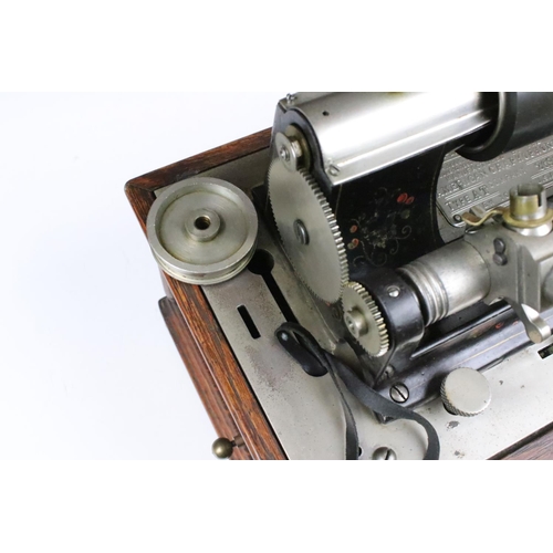 126 - 'The Graphophone' early 20th century Columbia Phonograph, Type AT, no. 269135, oak cased, with lid, ... 