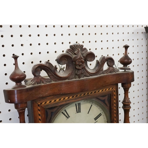 17 - Edwardian inlaid mahogany pendulum wall clock having a round face with roman numerals to the dial, m... 