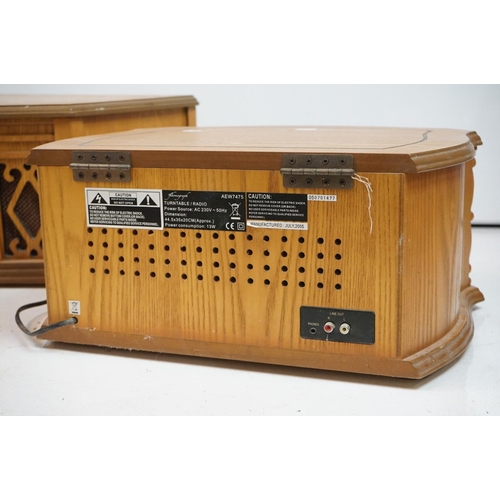 194 - Two vintage style music centres to include record player, CD player, radio and Aux line.