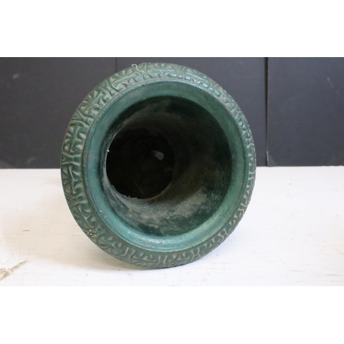 199 - Pair of cast iron urn planters of classic form, approx 34cm high