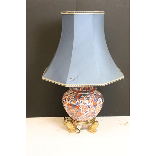 200 - Pair of Chinese Imari table lamps of shouldered form, the floral & foliate decoration with gilt deta... 