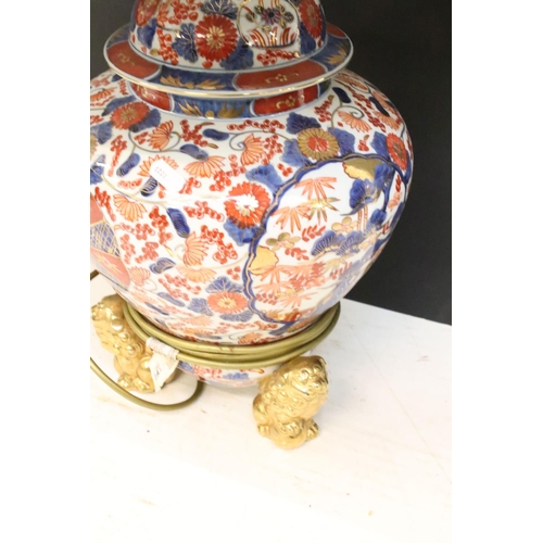 200 - Pair of Chinese Imari table lamps of shouldered form, the floral & foliate decoration with gilt deta... 