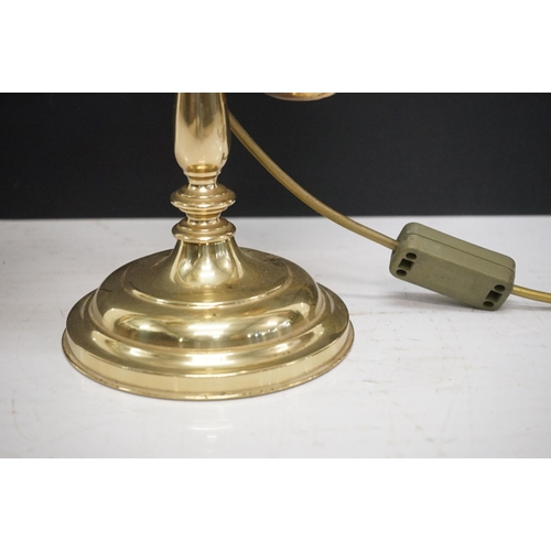 202 - Brass table lamp, the globular shade of etched design, 57.5cm high