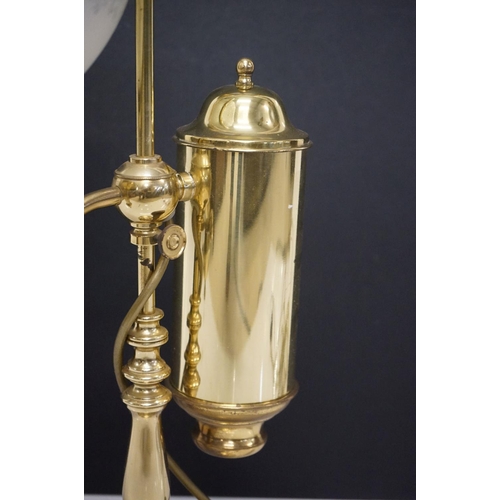 202 - Brass table lamp, the globular shade of etched design, 57.5cm high