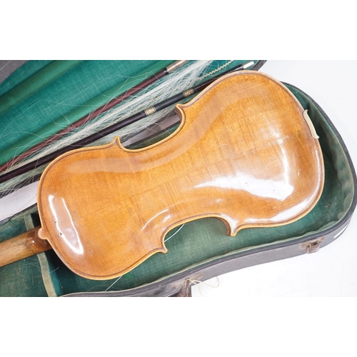 203B - A violin together with two violin bows, cased, label suggests this was possibly the property of Fran... 