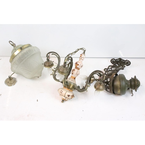 205 - Wrought iron basket on a hinged bracket, decorated with a scrolling design and a flower, impressed '... 