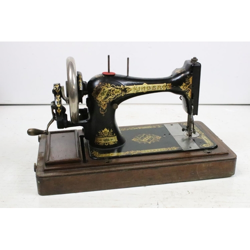 206 - Singer sewing machine, cased together with another sewing machine, cased, with a plaque ' A. W. Spen... 