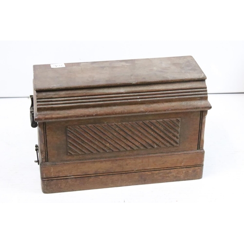 206 - Singer sewing machine, cased together with another sewing machine, cased, with a plaque ' A. W. Spen... 