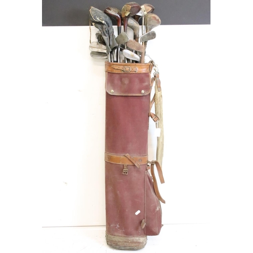 216 - Collection of golf clubs, within a canvas and leather bag, to include many Bobby Locke Triple Crown ... 