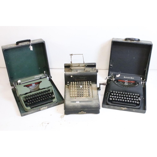 218 - Three typewriters, comprising: a Burroughs, an Olympia, cased and a Remington Rand, cased