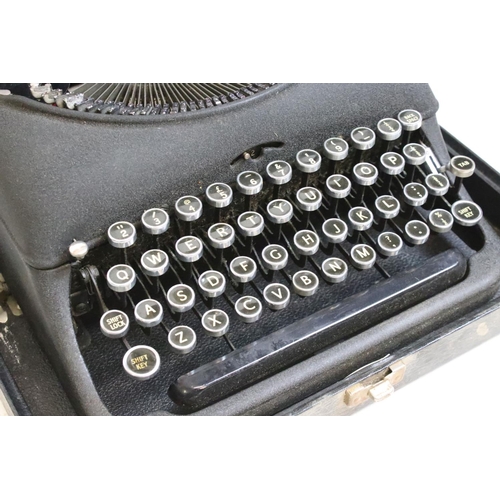 218 - Three typewriters, comprising: a Burroughs, an Olympia, cased and a Remington Rand, cased