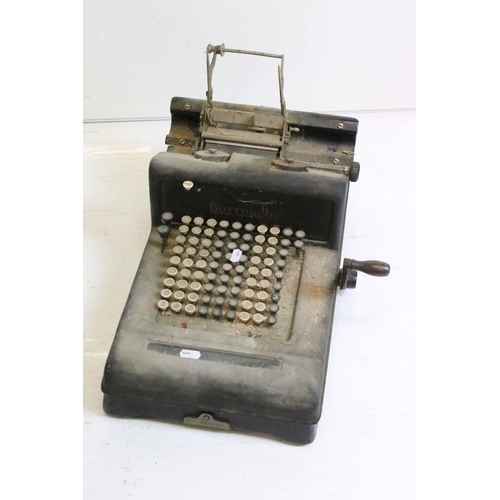 218 - Three typewriters, comprising: a Burroughs, an Olympia, cased and a Remington Rand, cased