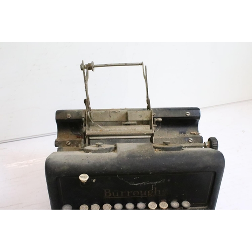 218 - Three typewriters, comprising: a Burroughs, an Olympia, cased and a Remington Rand, cased