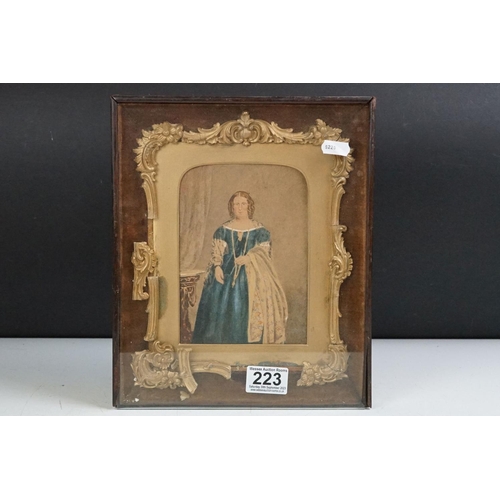 223 - A 19th century picture frame, the outer case with glazed panel enclosing an ornate gilt frame framin... 