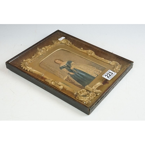 223 - A 19th century picture frame, the outer case with glazed panel enclosing an ornate gilt frame framin... 