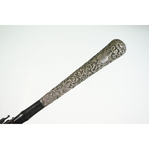 23 - Early 20th century parasol with scrolling foliate white metal handle (92cm long), together with an e... 
