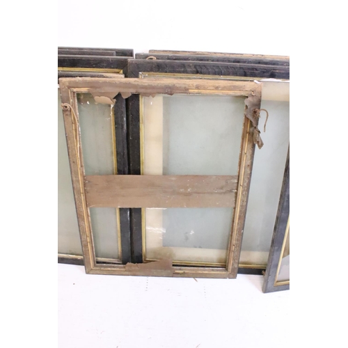 265 - Thirteen wooden picture frames, of similar but varying sizes, average 83 x 70.5cm