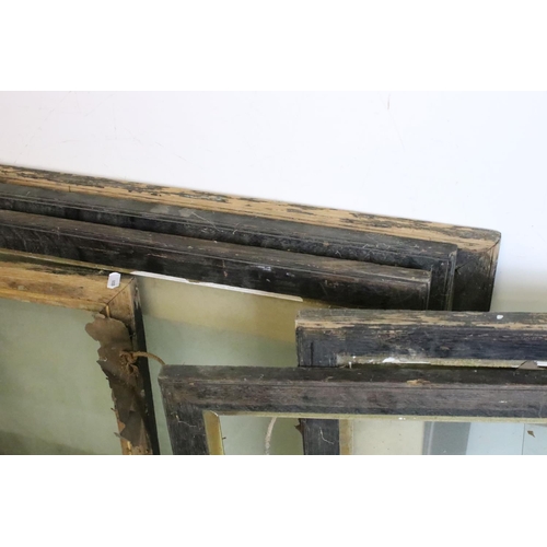 265 - Thirteen wooden picture frames, of similar but varying sizes, average 83 x 70.5cm