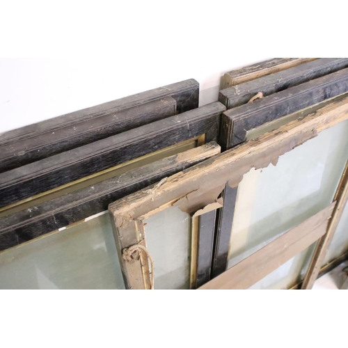 265 - Thirteen wooden picture frames, of similar but varying sizes, average 83 x 70.5cm