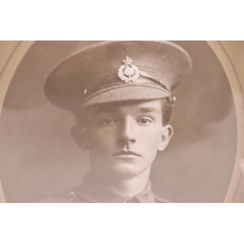 267 - A late 19th century picture frame, the stained rosewood outer case with glazed panel enclosing an or... 