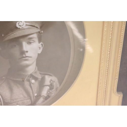 267 - A late 19th century picture frame, the stained rosewood outer case with glazed panel enclosing an or... 